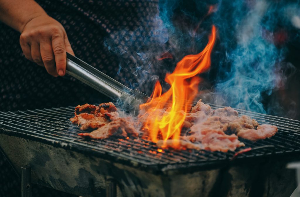 man barbecuing